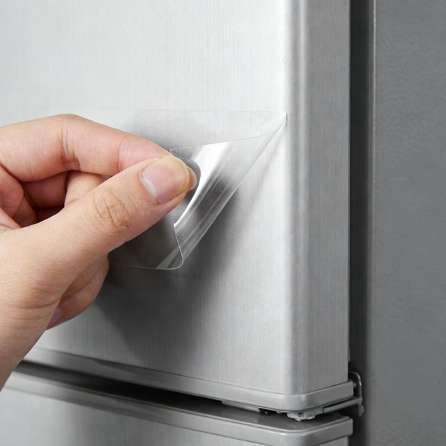 Película protectora de superficie extraíble para frigorífico.